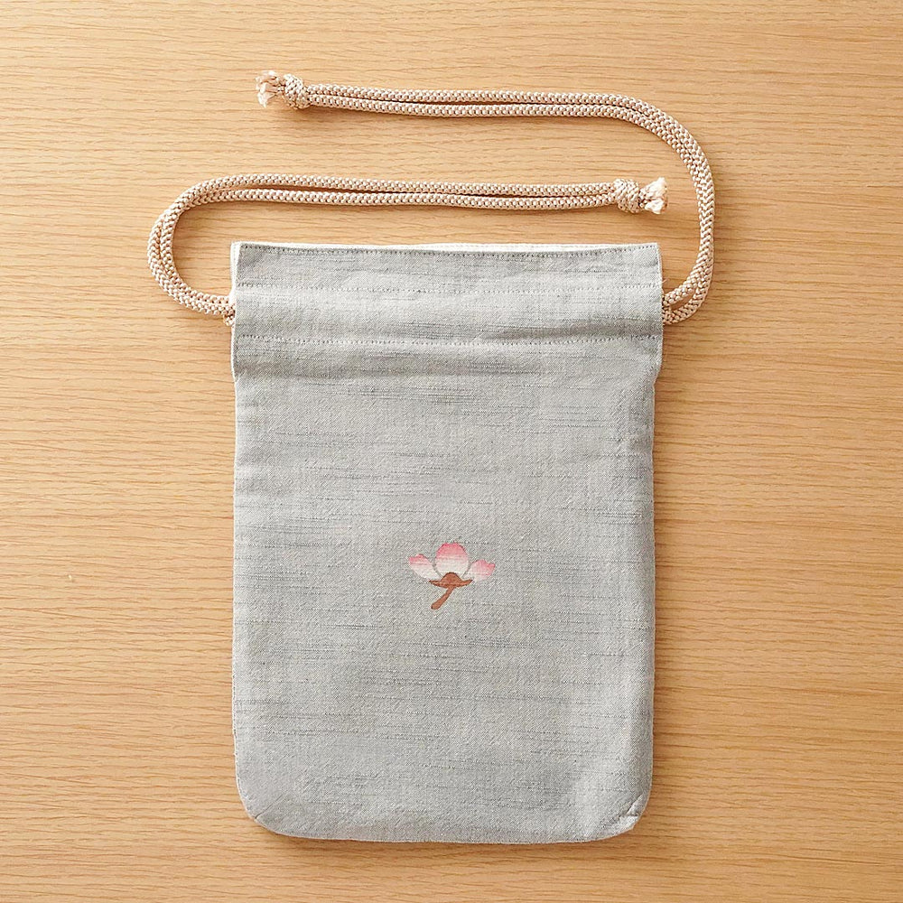 
                  
                    浅草の型染め工房本品堂（ポンピン堂）の合切袋　桜　文様　型染め　更銈　テキスタイル
                  
                