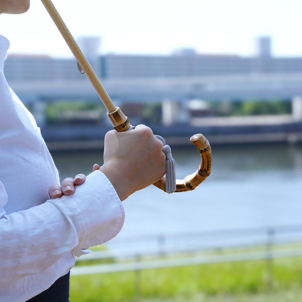 
                  
                    浅草の型染め工房本品堂（ポンピン堂）の晴雨兼用傘　KOSHIGYOGI　文様　型染め　更銈　テキスタイル
                  
                